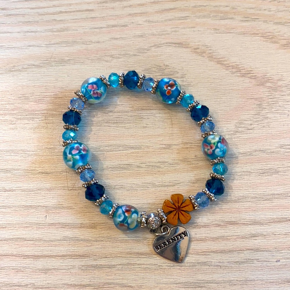 Blue  bracelet with beads it’s stretchy